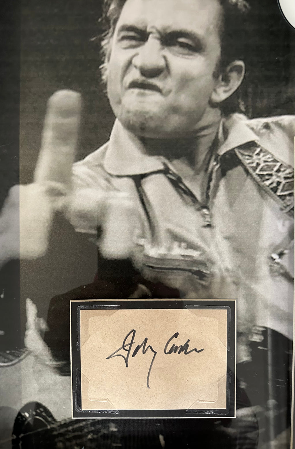 Johnny Cash autographed cut out with "I Walk the Line" sheet music