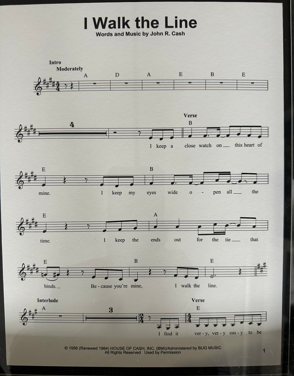 Johnny Cash autographed cut out with "I Walk the Line" sheet music