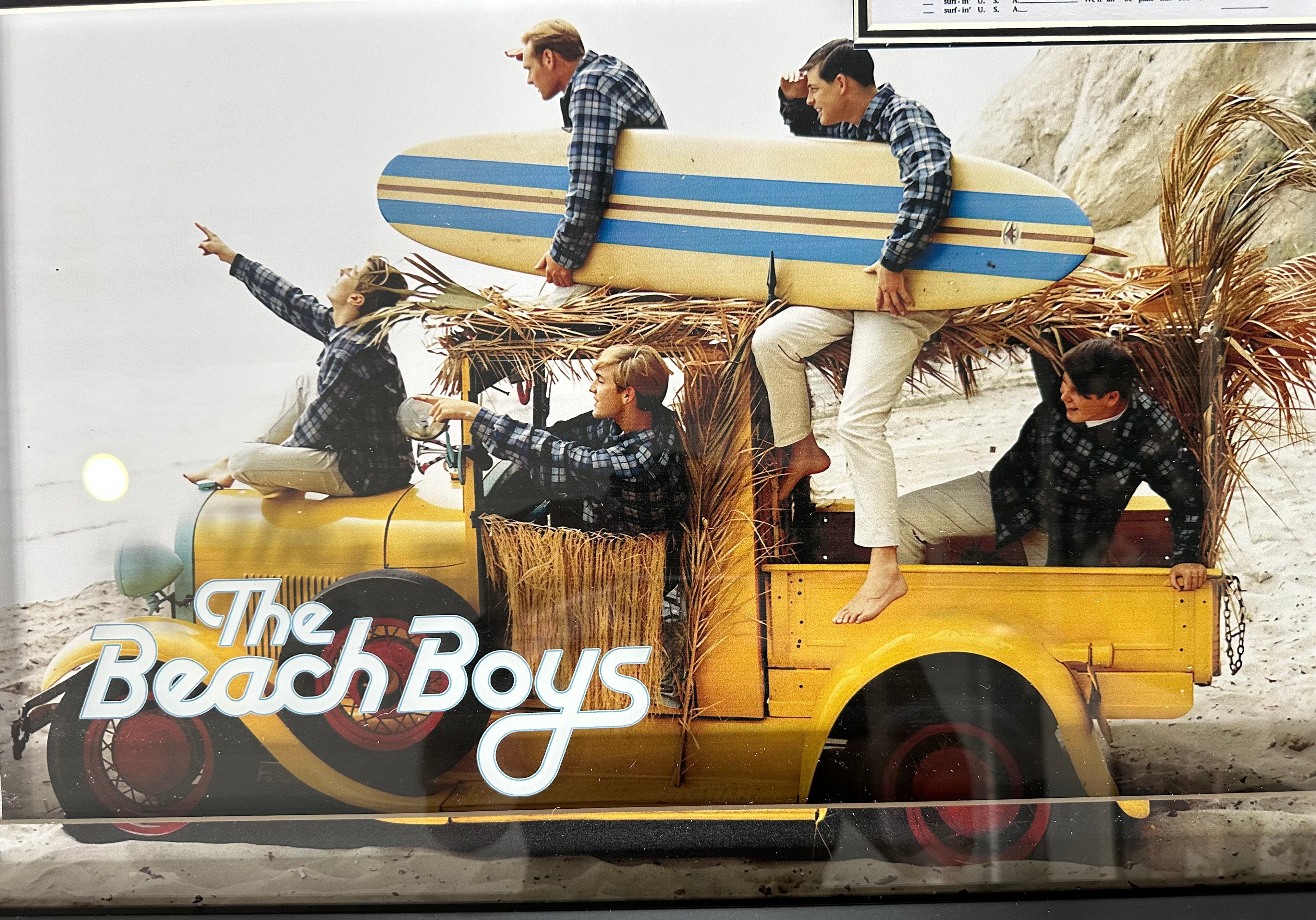 The Beach Boys Brian Wilson autographed 8x10 photo with "Surfin' U.S.A." sheet music