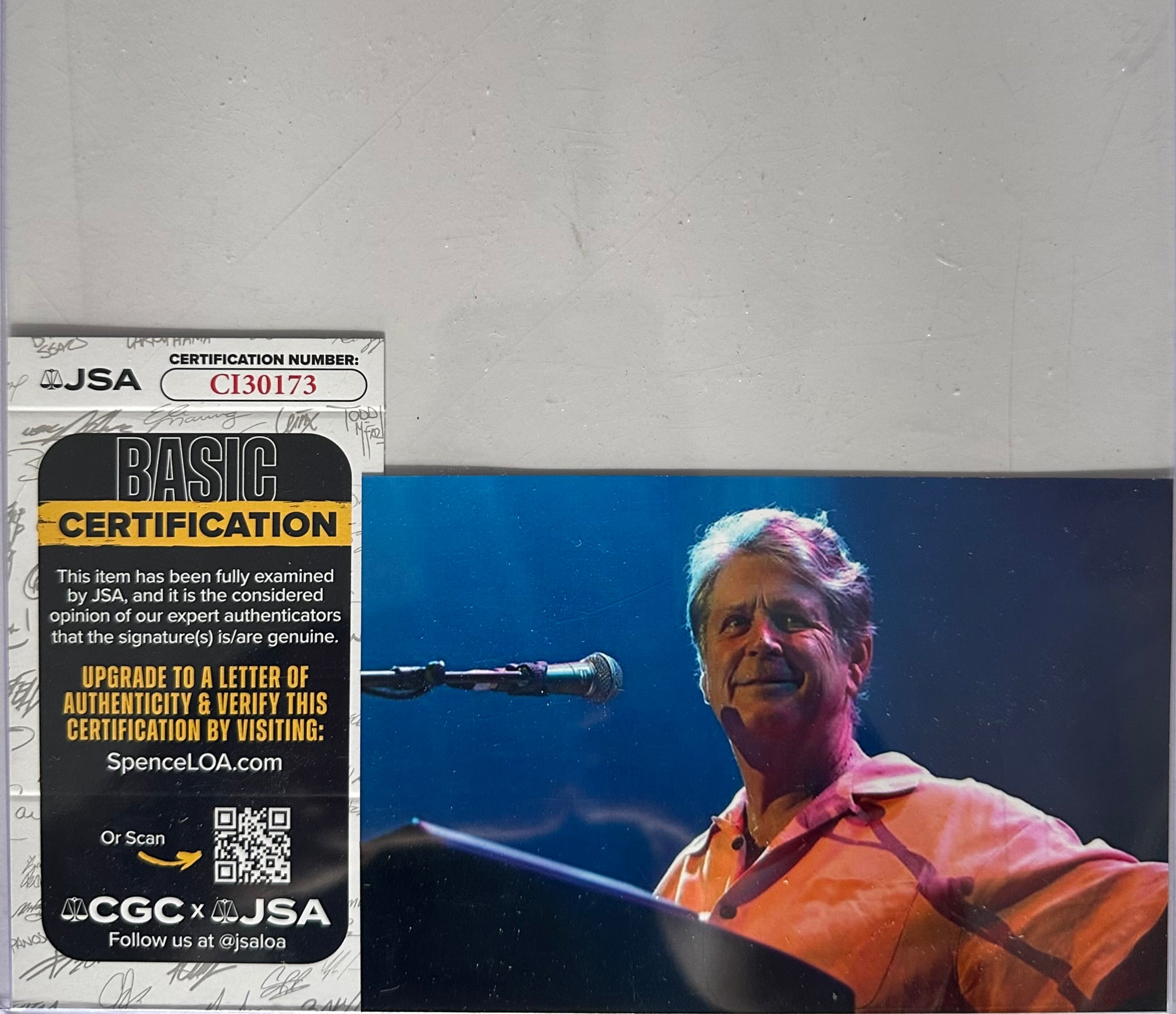 The Beach Boys Brian Wilson autographed 8x10 photo with "Surfin' U.S.A." sheet music