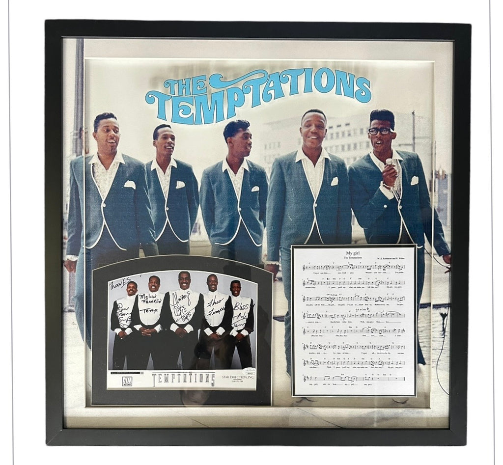 The Temptations band autographed with "My Girl" sheet music