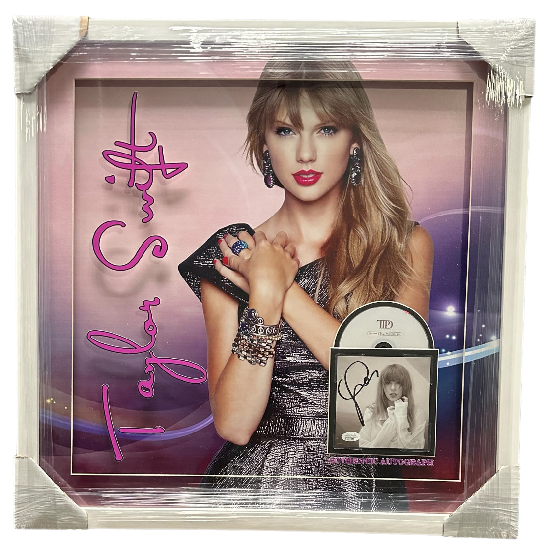 Taylor Swift with "The Manuscript" Autographed CD
