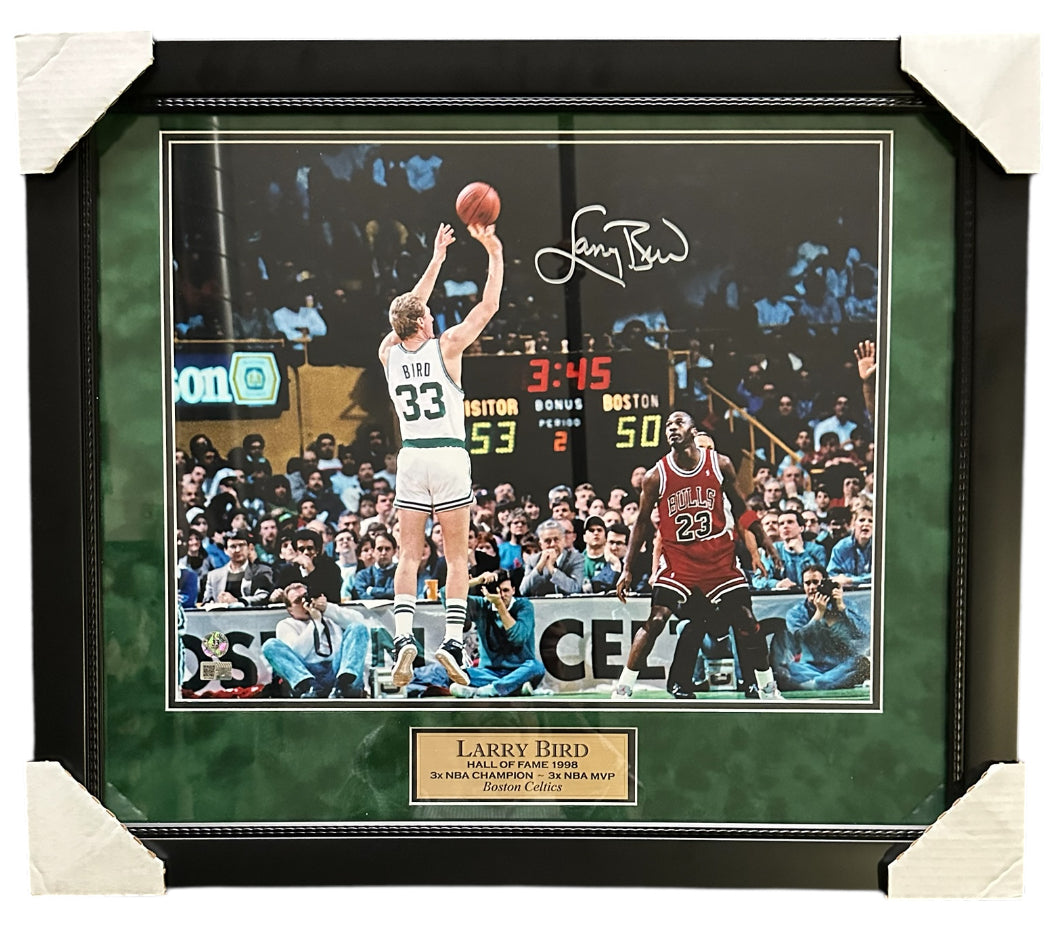 Boston Celtics - Larry Bird shooting over Michael Jordan - Autographed by Larry