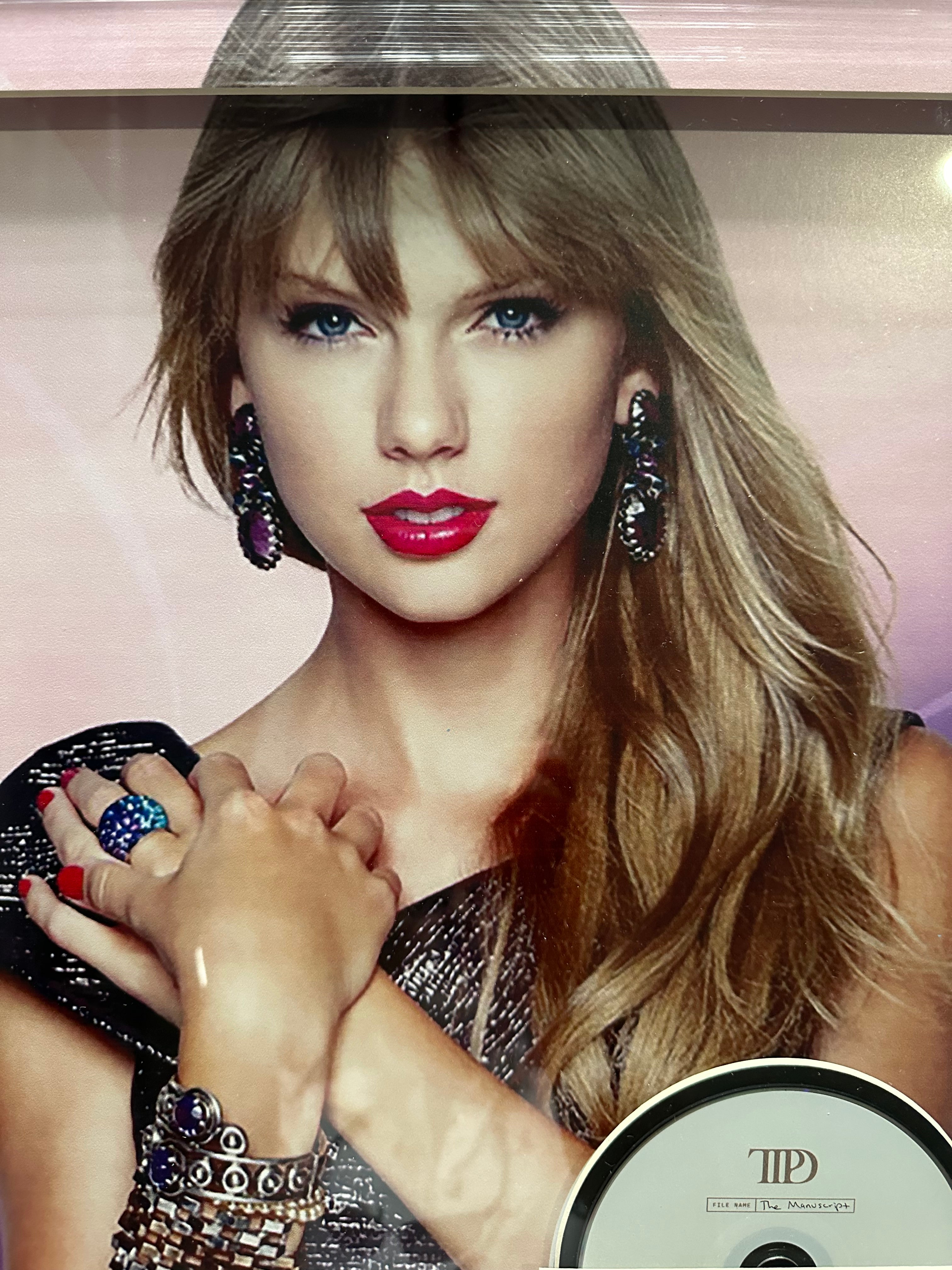 Taylor Swift with "The Manuscript" Autographed CD