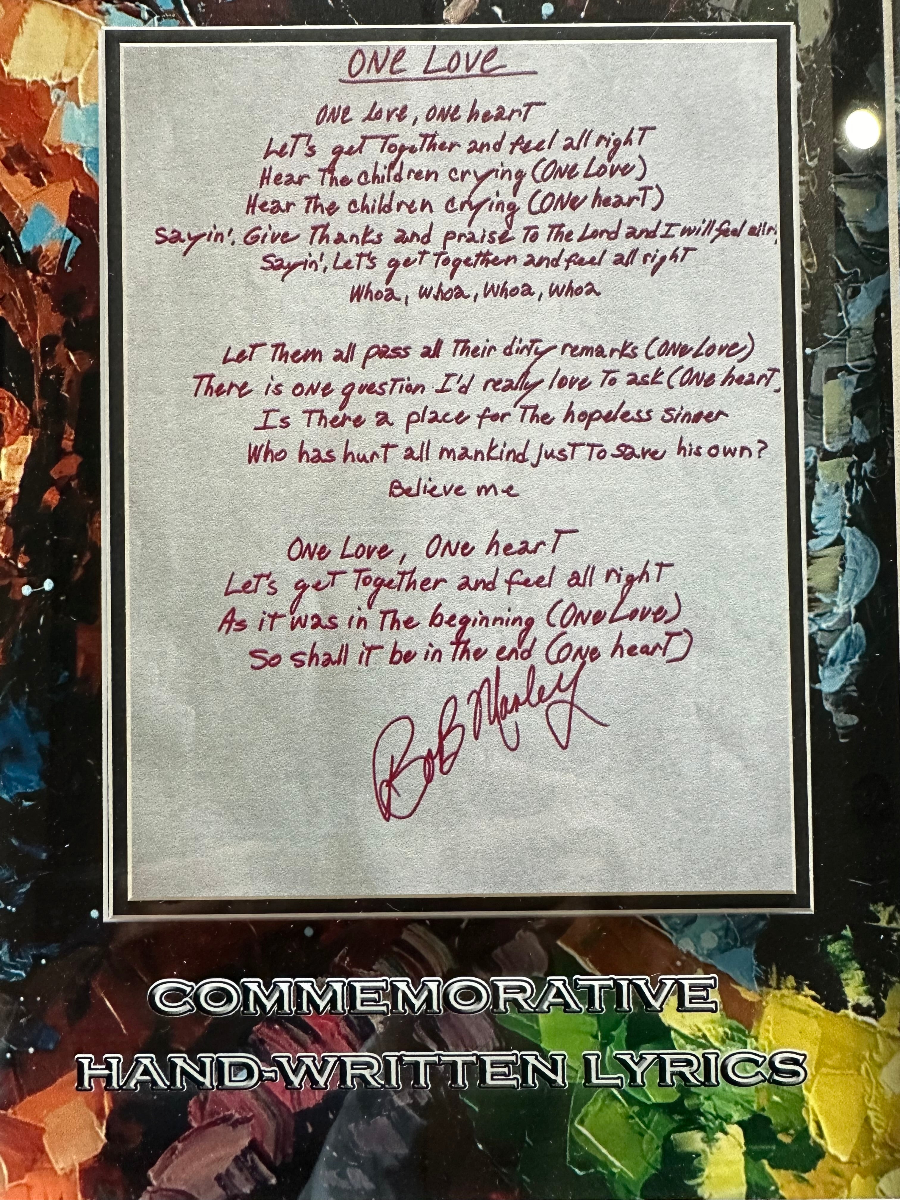 Bob Marley with "One Love" replica lyrics