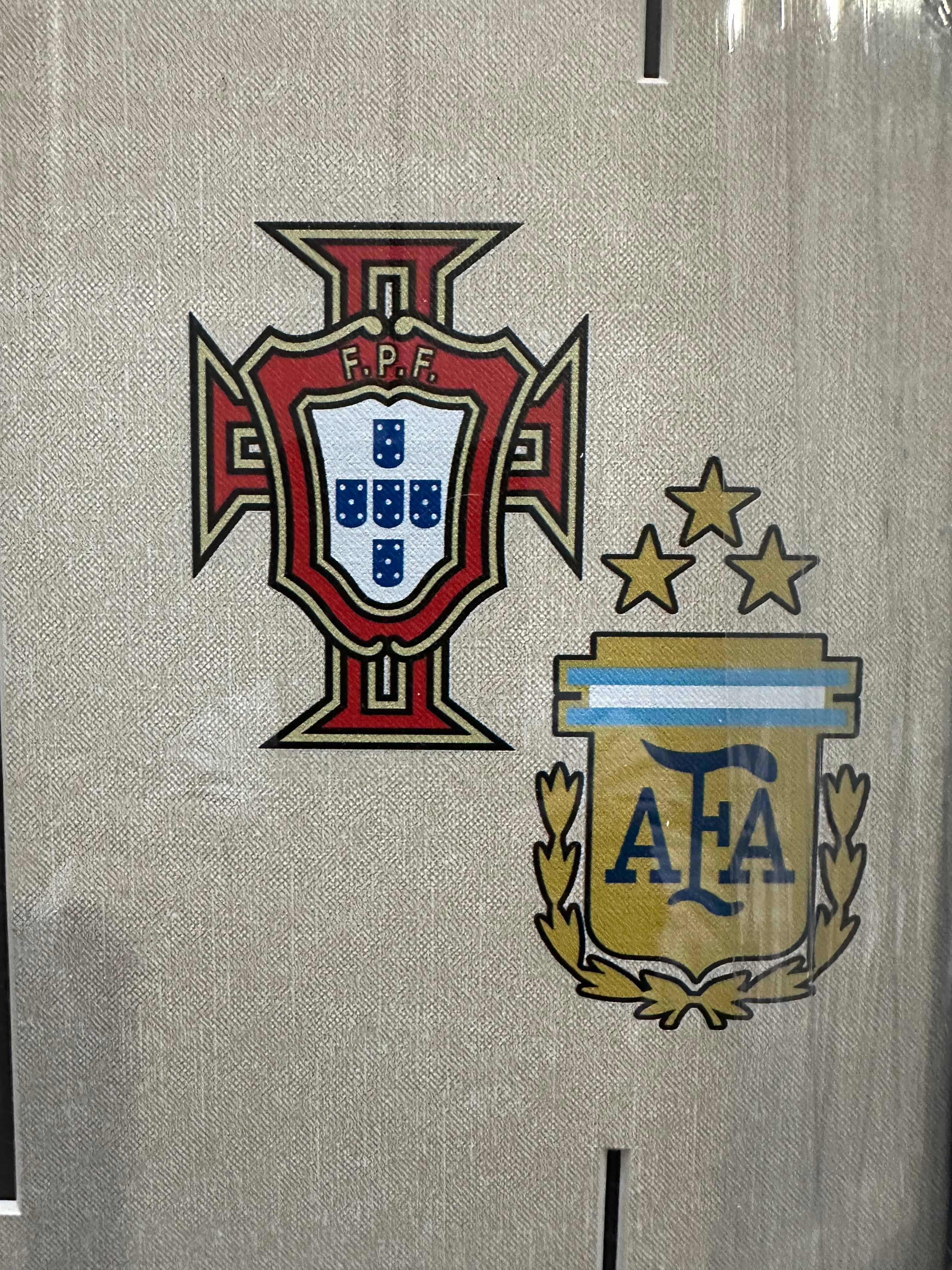 Ronaldo & Messi with team crest