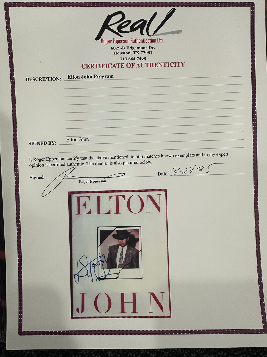 Elton John autographed program with pictures