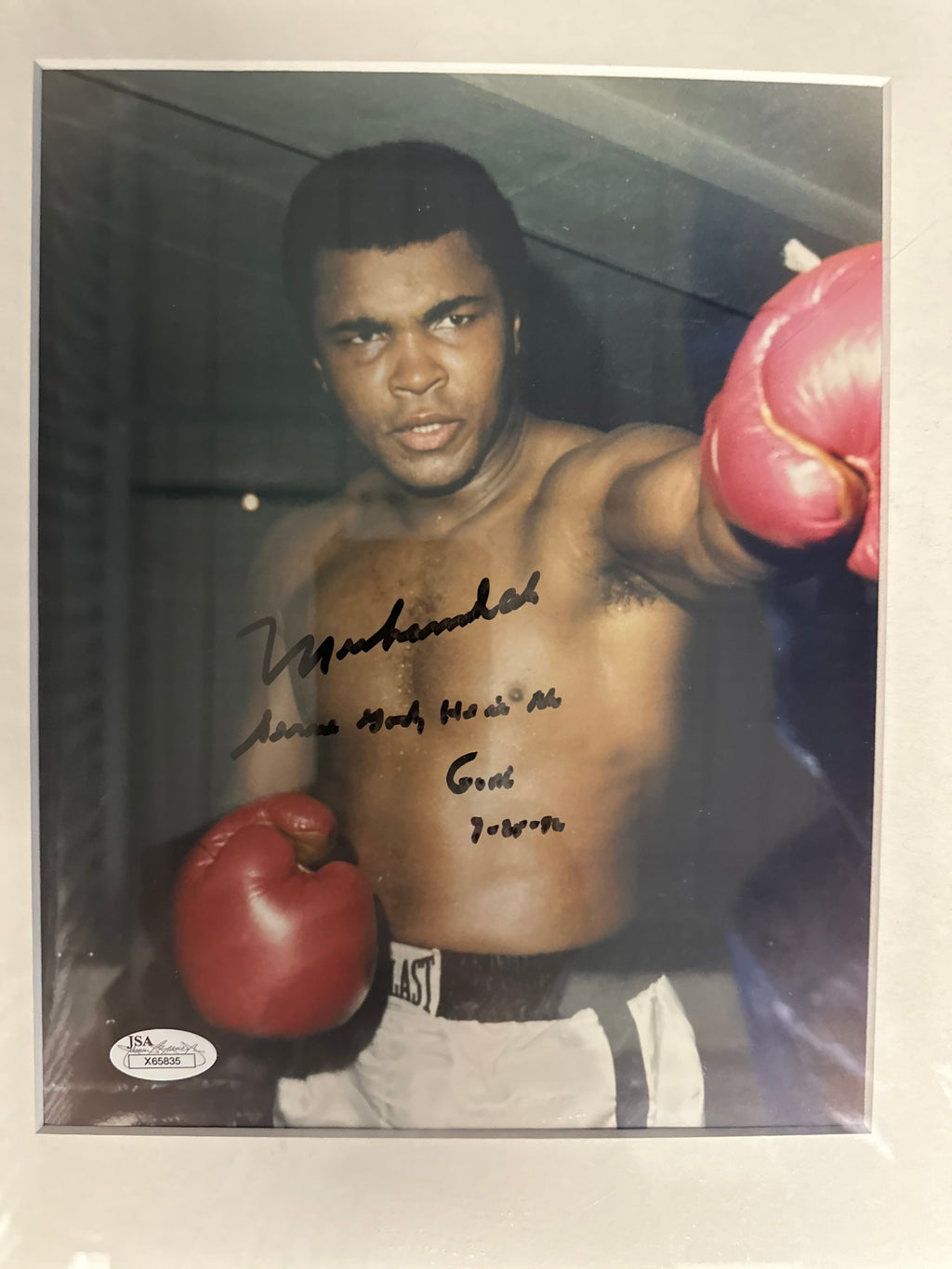 Muhammad Ali Autographed 8 x 10 photo and Boxing shorts
