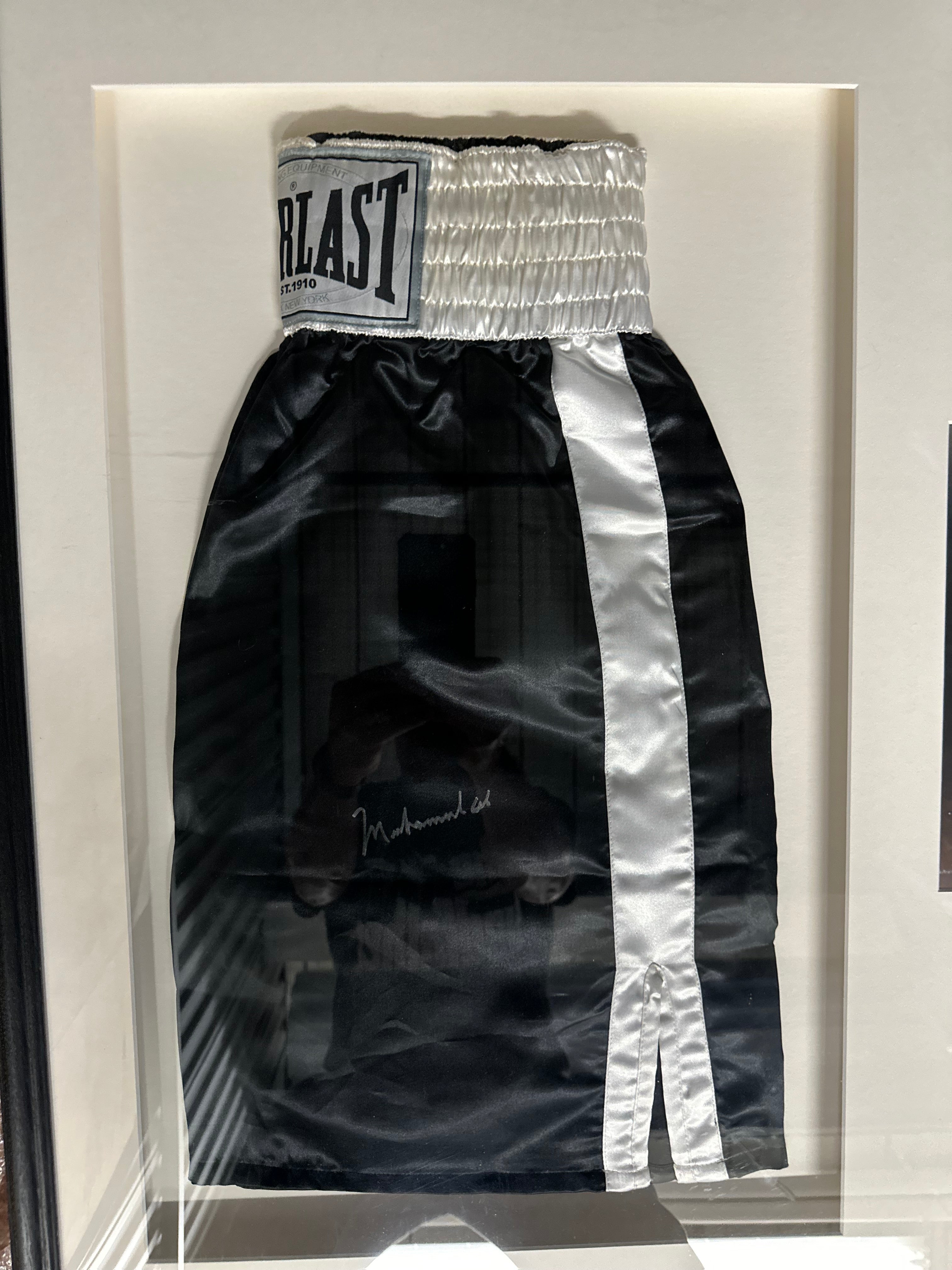 Muhammad Ali Autographed 8 x 10 photo and Boxing shorts