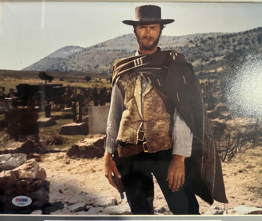 Clint Eastwood autographed 11x14 photo with 39 Eastwood movie posters