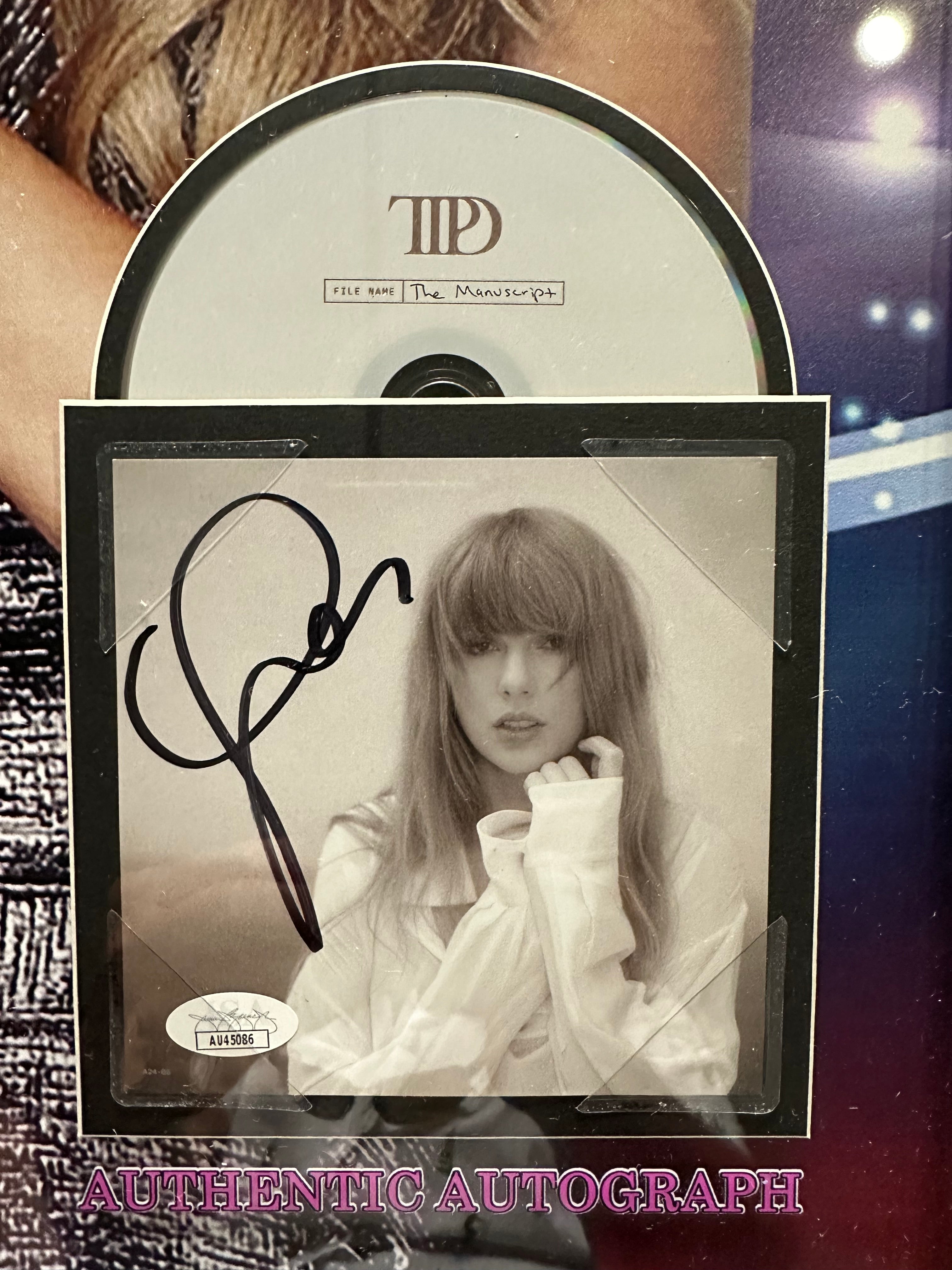 Taylor Swift with "The Manuscript" Autographed CD