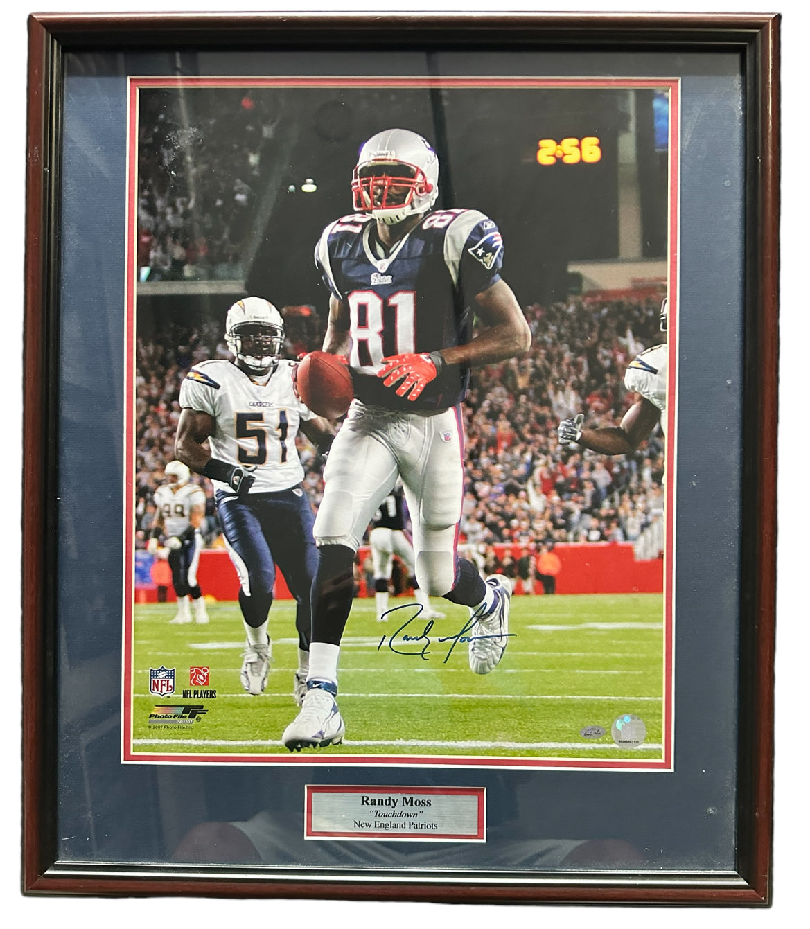 New England Patriots - Randy Moss "Touchdown" Autographed 16 x 20
